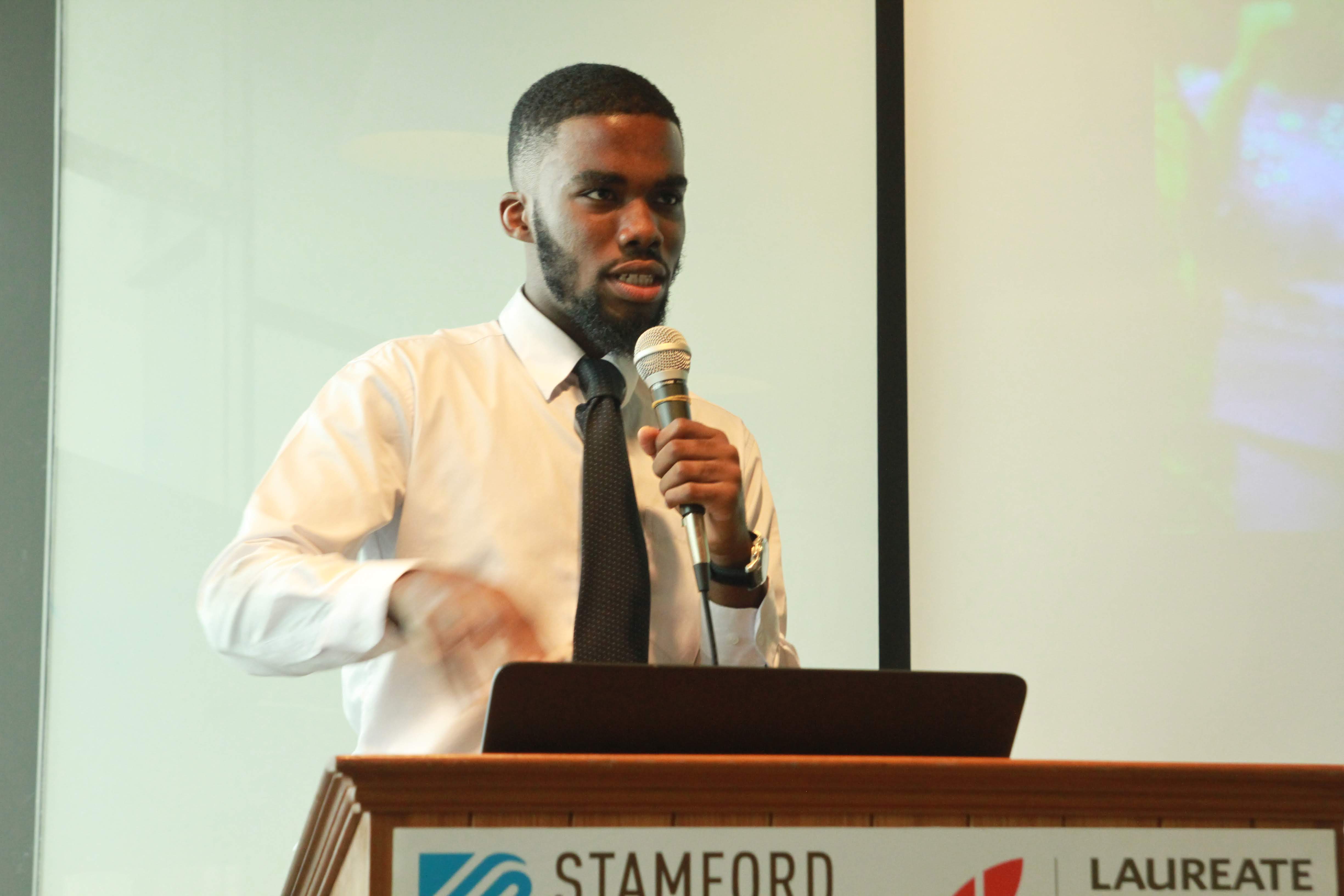 Russell speaking to an audience at university
